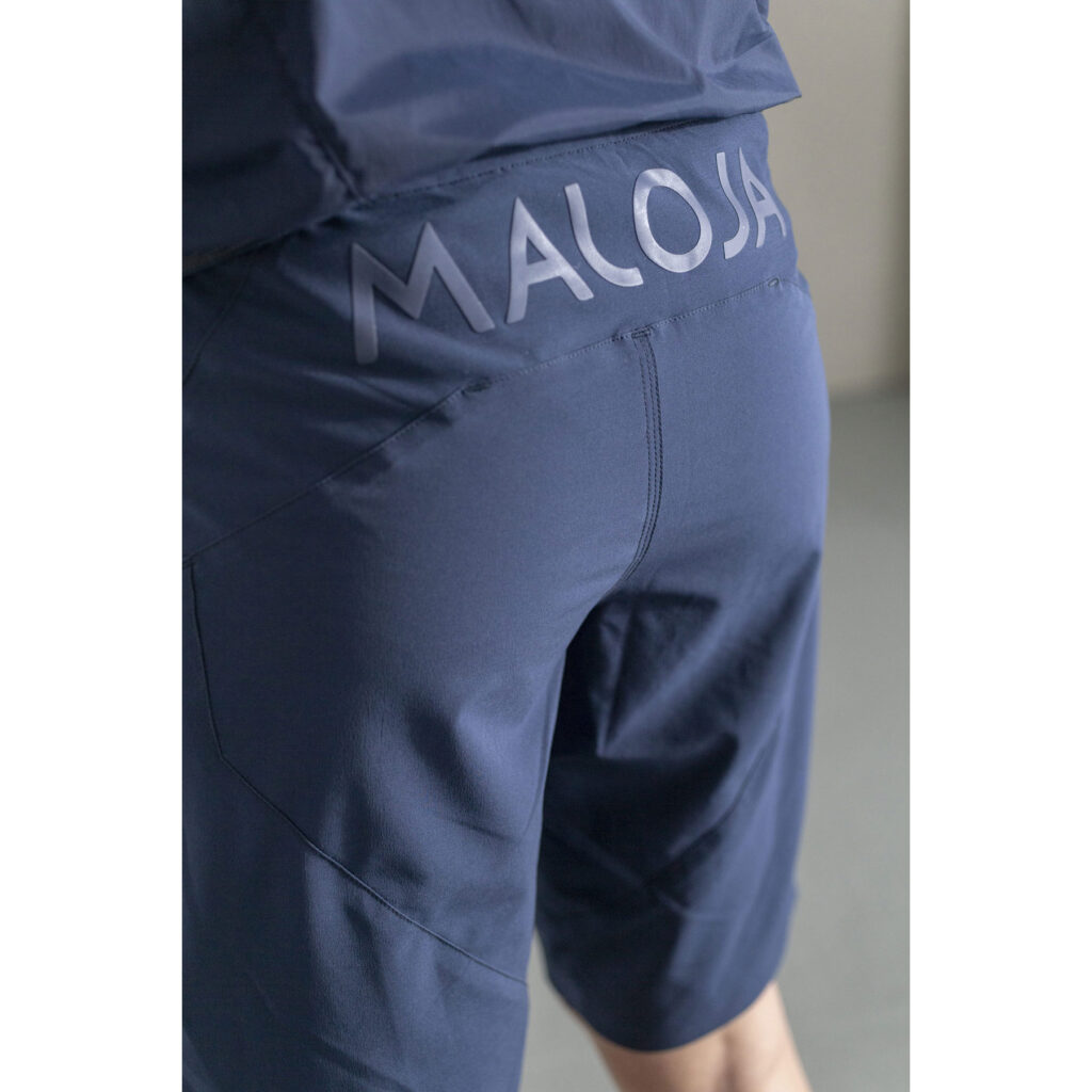 Man wearing Maloja multisport shorts.
