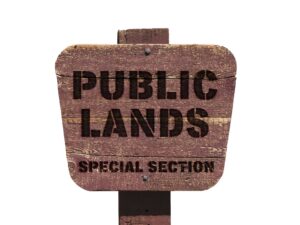 Wooden sign saying "Public Lands special section."