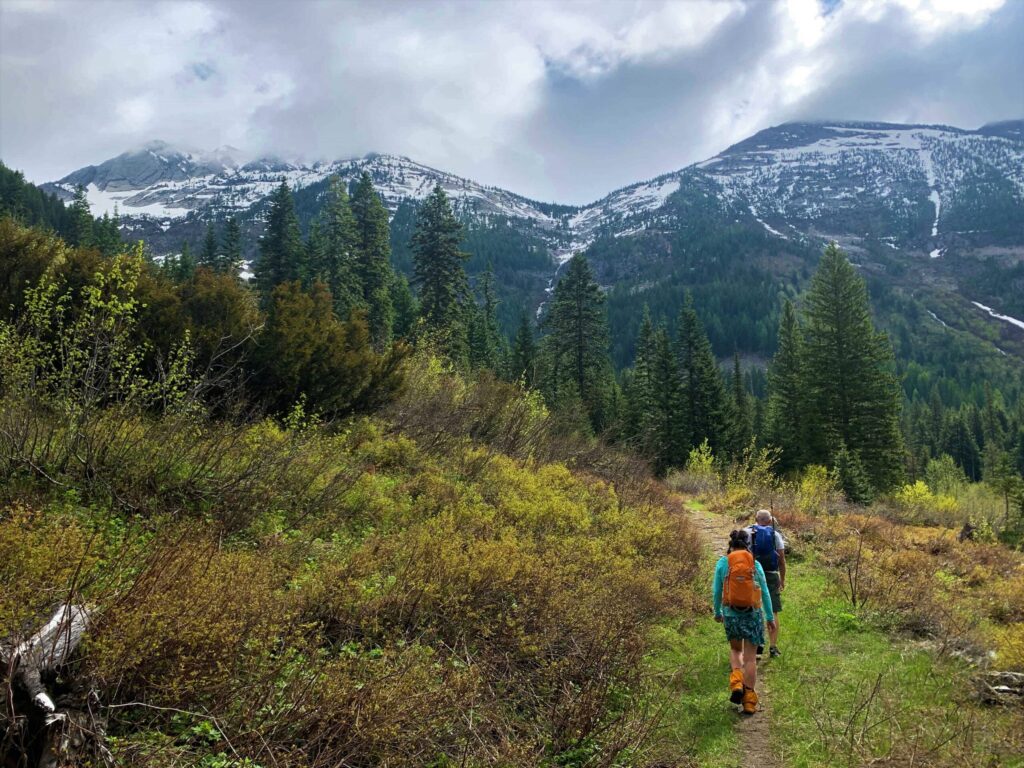 Family hiking through mountains.