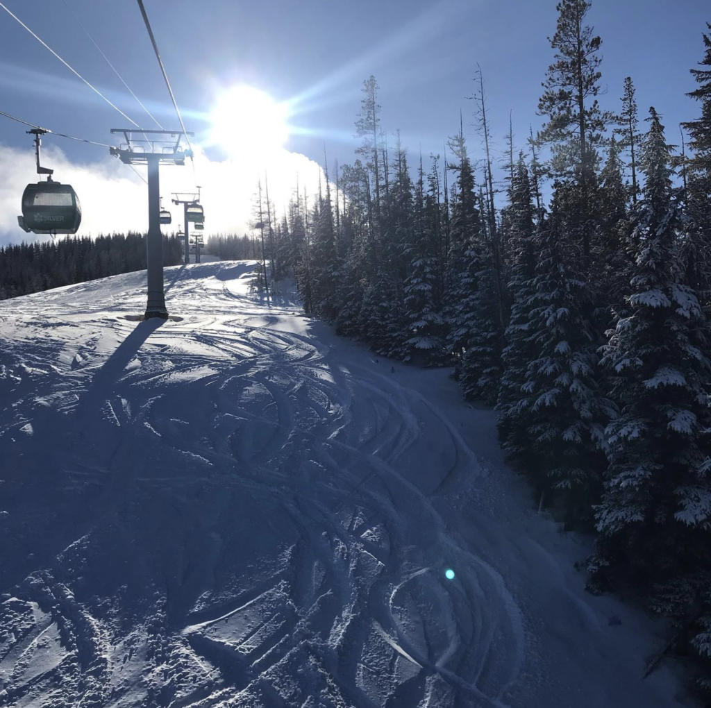 Powder tracks on the run under the gondola at Silver Mountain Resort.