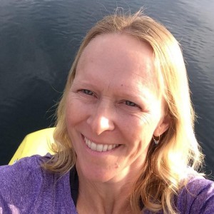 Crystal Atamian's profile of them smiling while kayaking.