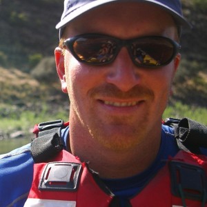 Harley McAllister's profile of them smiling with rafting gear.