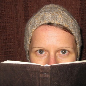 S Michal Bennett profile of them behind a book.