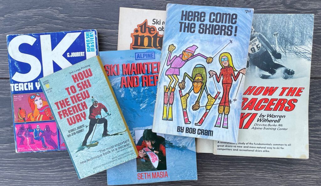 A collection of six vintage ski instruction, how-to guidebooks.
