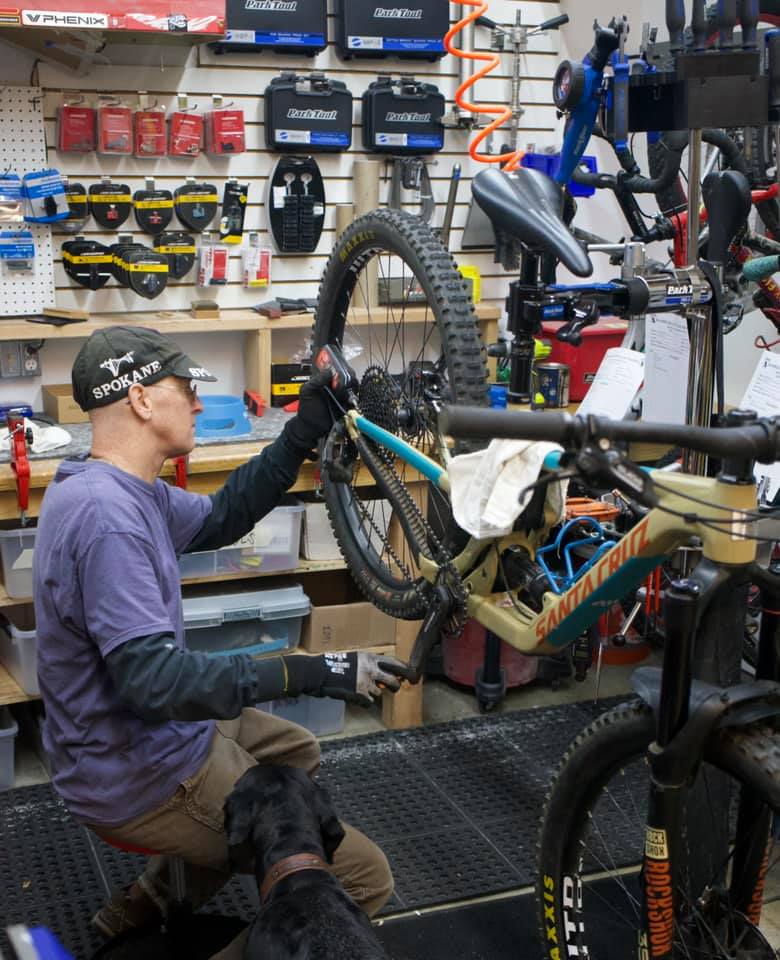 Mathew Larsen keeping things rolling at the Rambleraven Gear Trader bike shop.