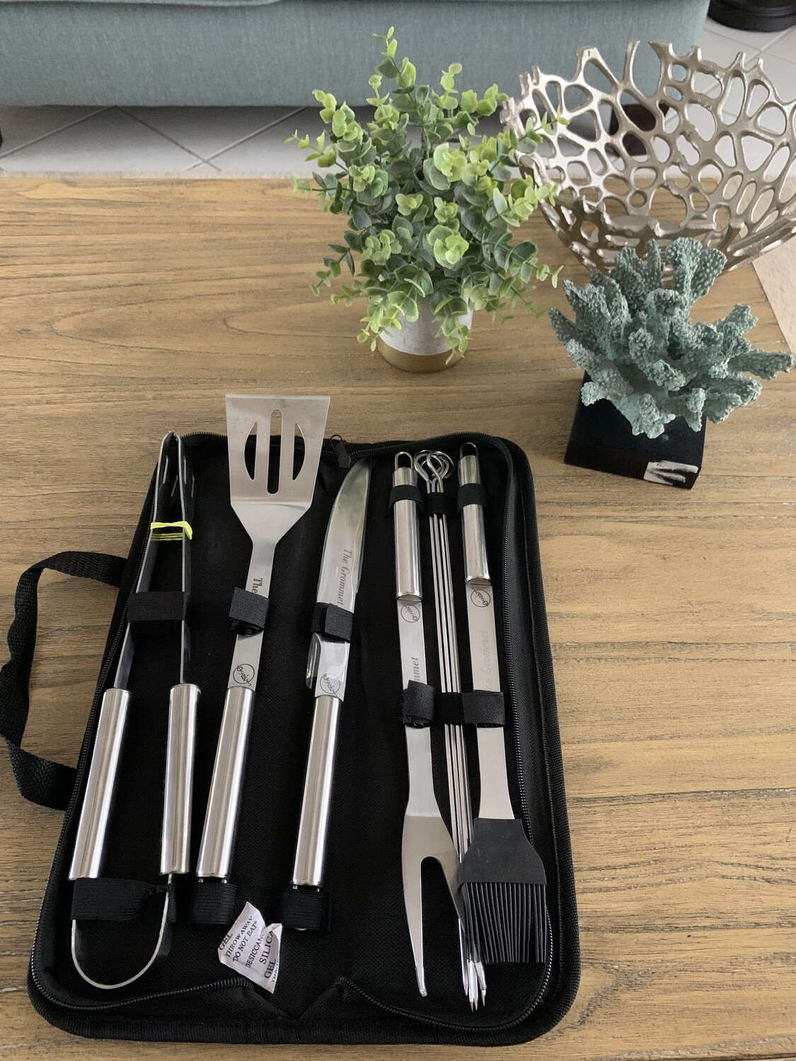 O-Yaki Grilling stainless steel accessories, including skewer, tons, and spatula, in a black carry-case.