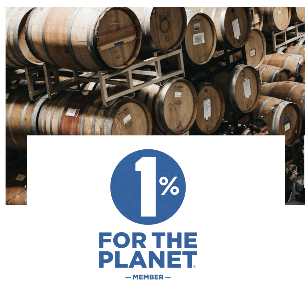 1% For the Planet sign at Townshend Cellar winery, with wine barrels in the background.