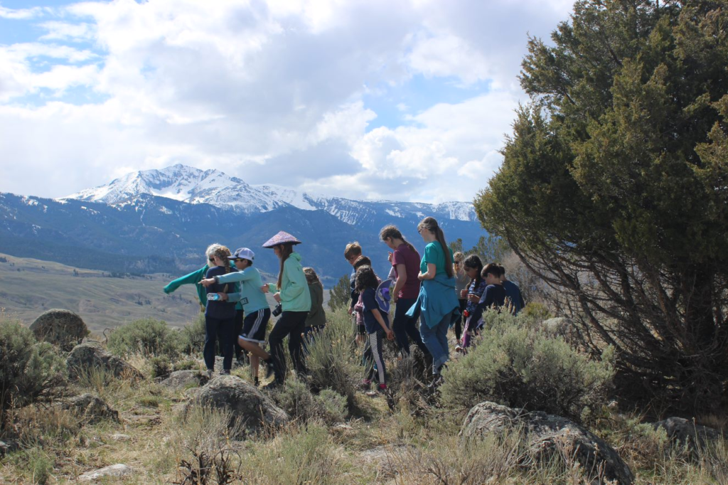 Elementary students learning and exploring at Yellowstone National Park.