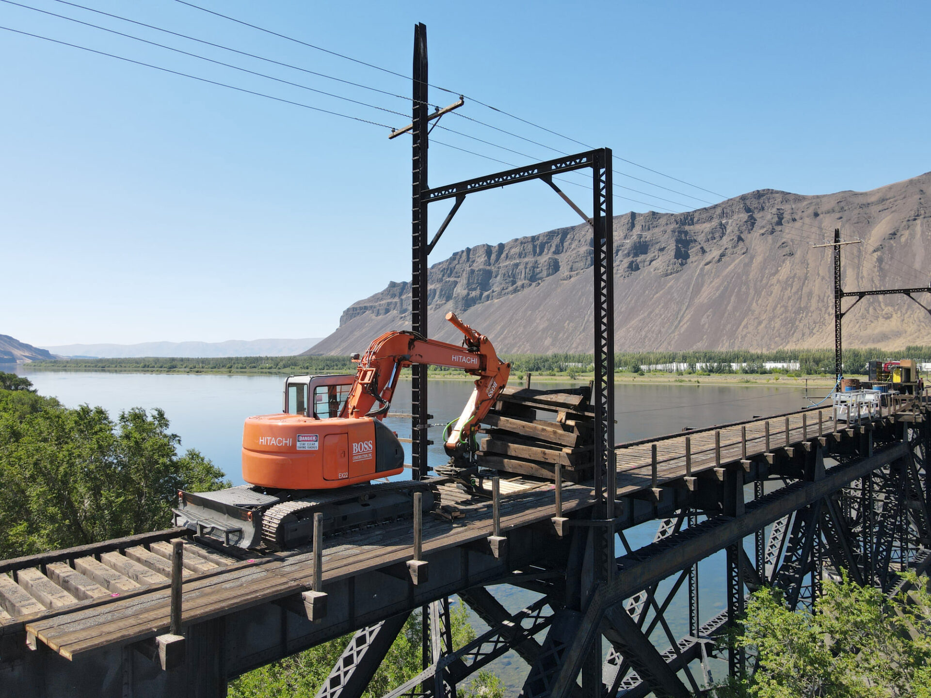 Construction equipment working to restore the historic Beverly Bridge across the Columbia River.