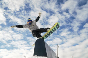 Snowboarder on a terrain park rail at Mt Spokane.