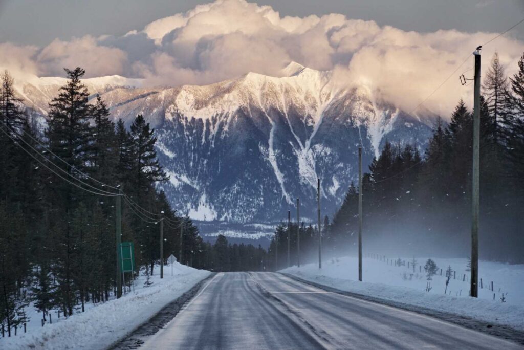 View of an empty highway in the Kootenay mountains of British Columbia -- the Powder Highway.