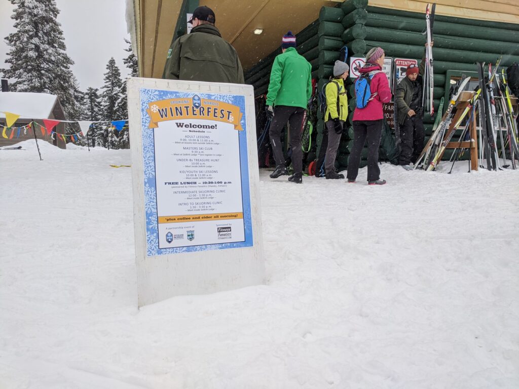Winterfest sandwich board sign in the snow