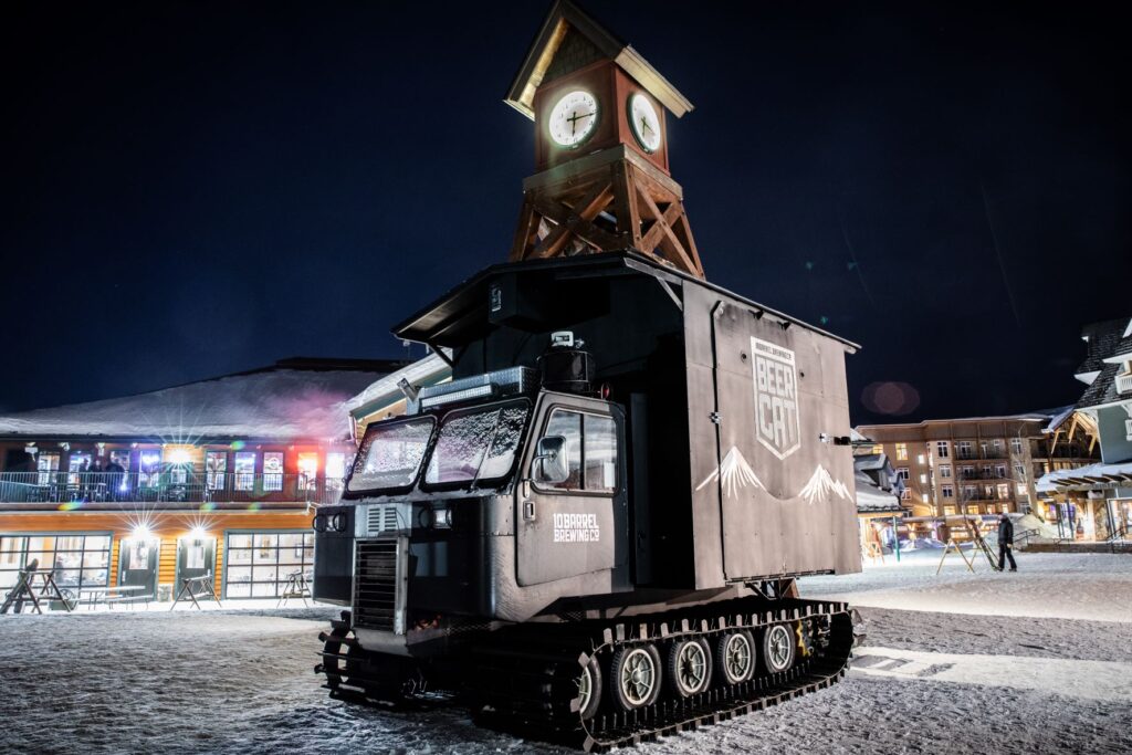 10 Barrel Beercat mobile pub parked in front of Lakeview Lodge at Schweitzer Village.