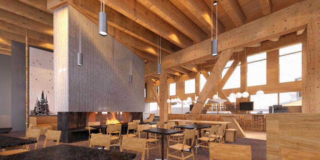 Indoors at the Crow's Nest restaurant, with light wood beam accents on the ceiling and window frames, and wood furniture.