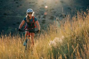 Rider Kelsey Webster on the Watchmen Trail in the Boise Foothills Trail System, which wind some 200 miles into the gullies and grasslands north of town.