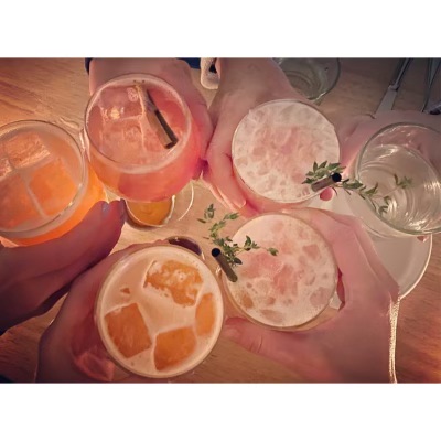 View looking own at a variety of glasses containing festive beverages.